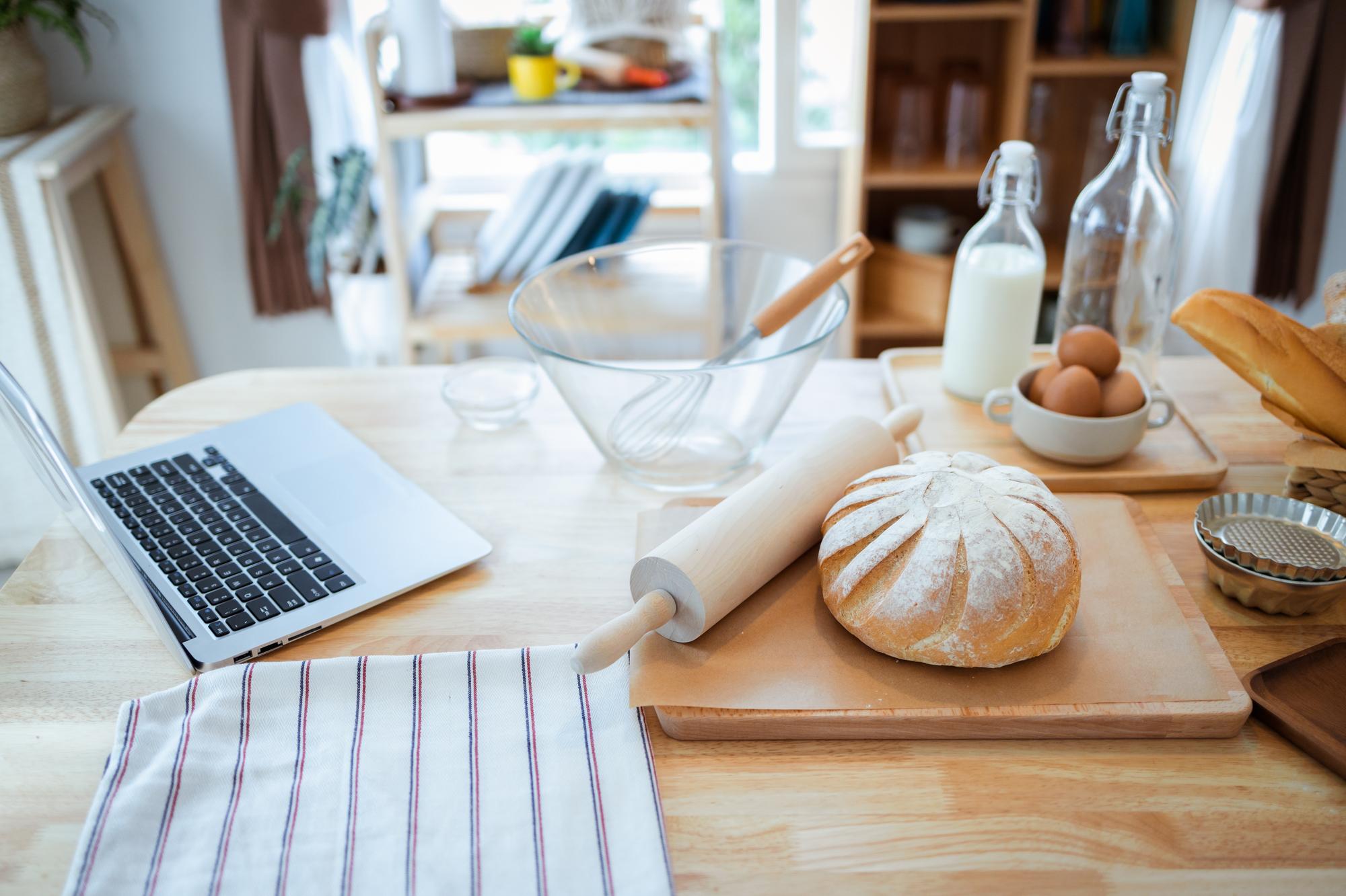 Open kitchen counter with ingredients and notebook