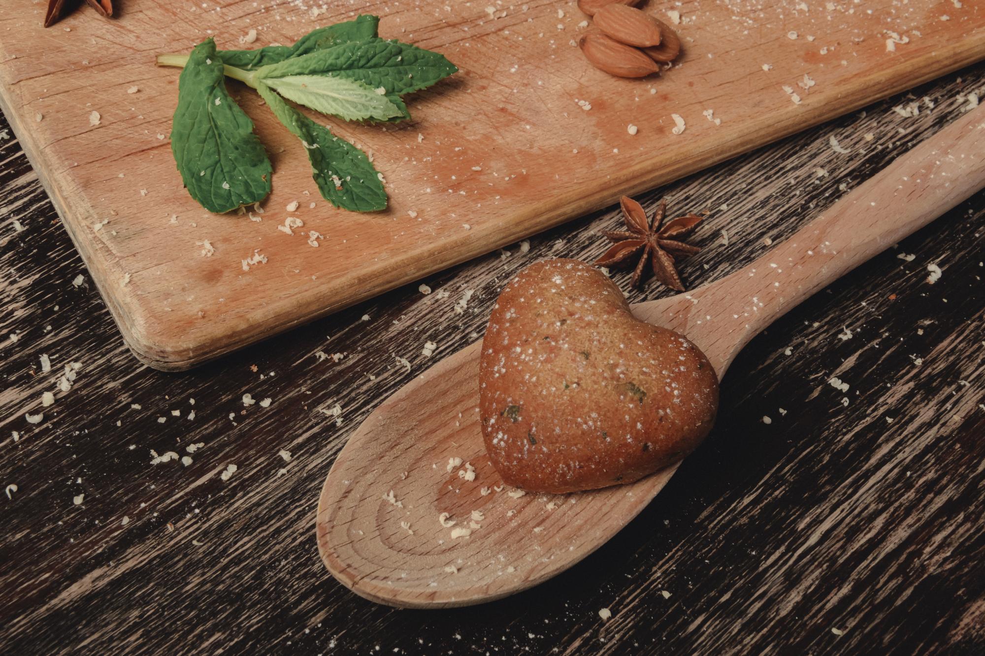 Close-up of bread crust and herbs